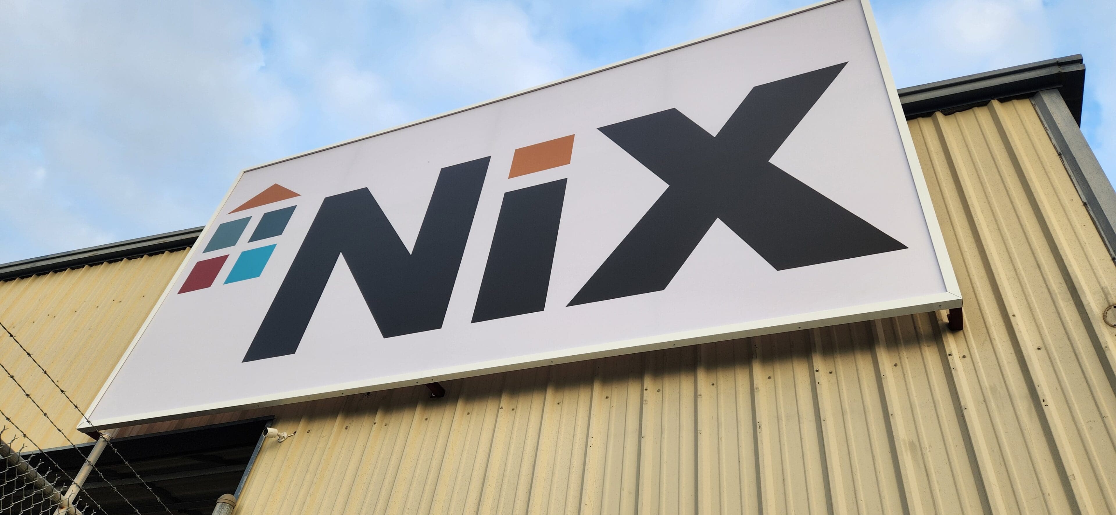 A wix sign on the side of a building.