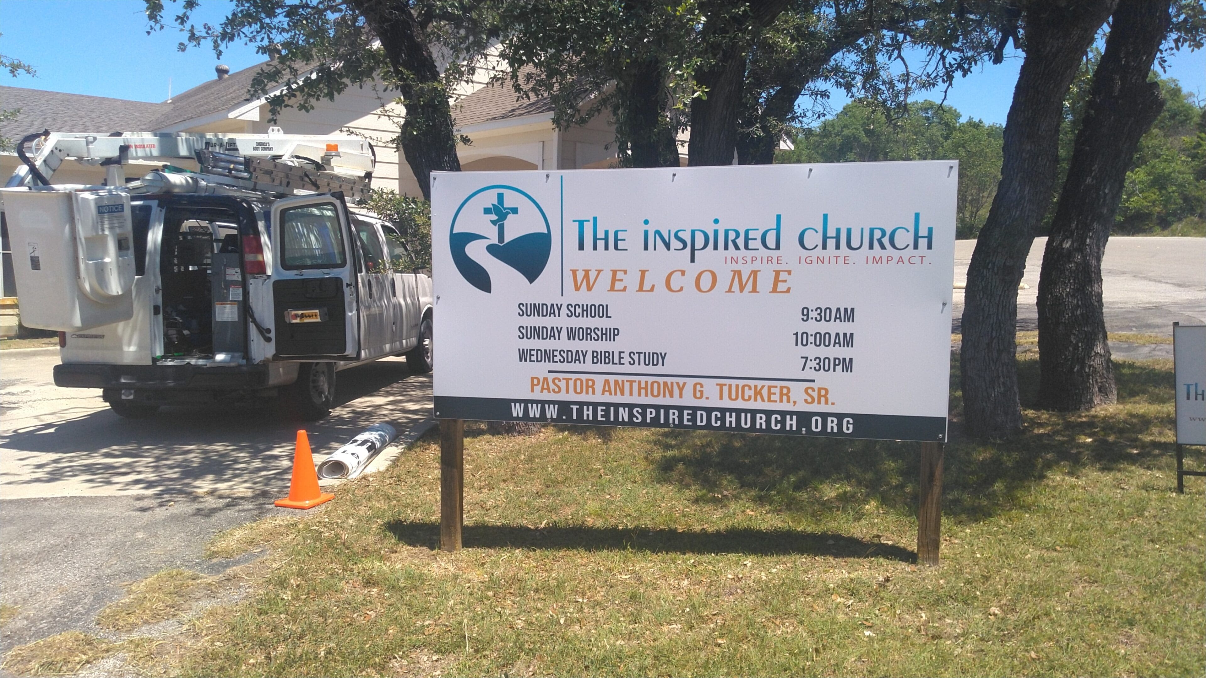 A sign that says the inspired church welcome.